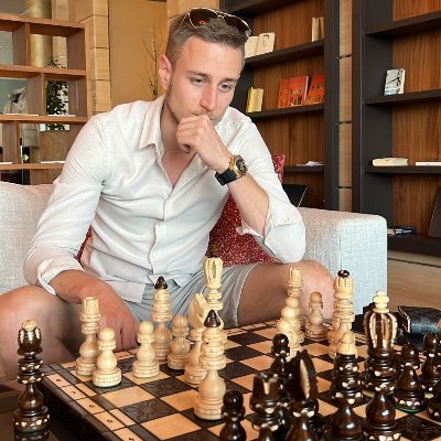 Rok Meško playing chess